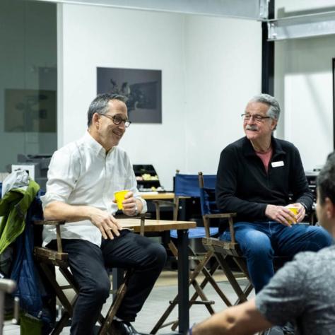Two men chatting